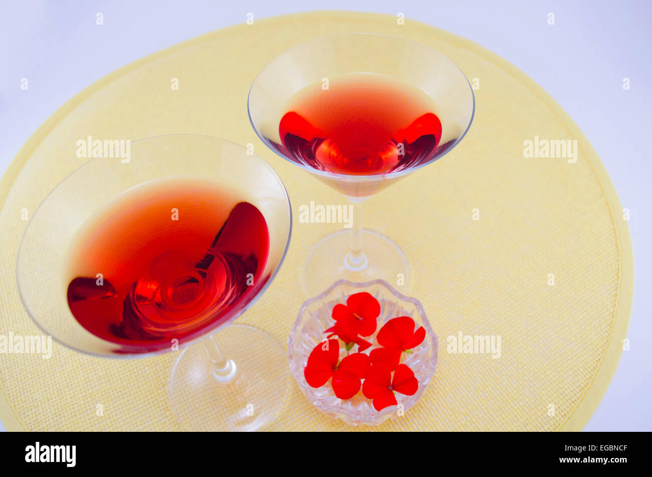 Two martini glasses filled with red drink Stock Photo Alamy