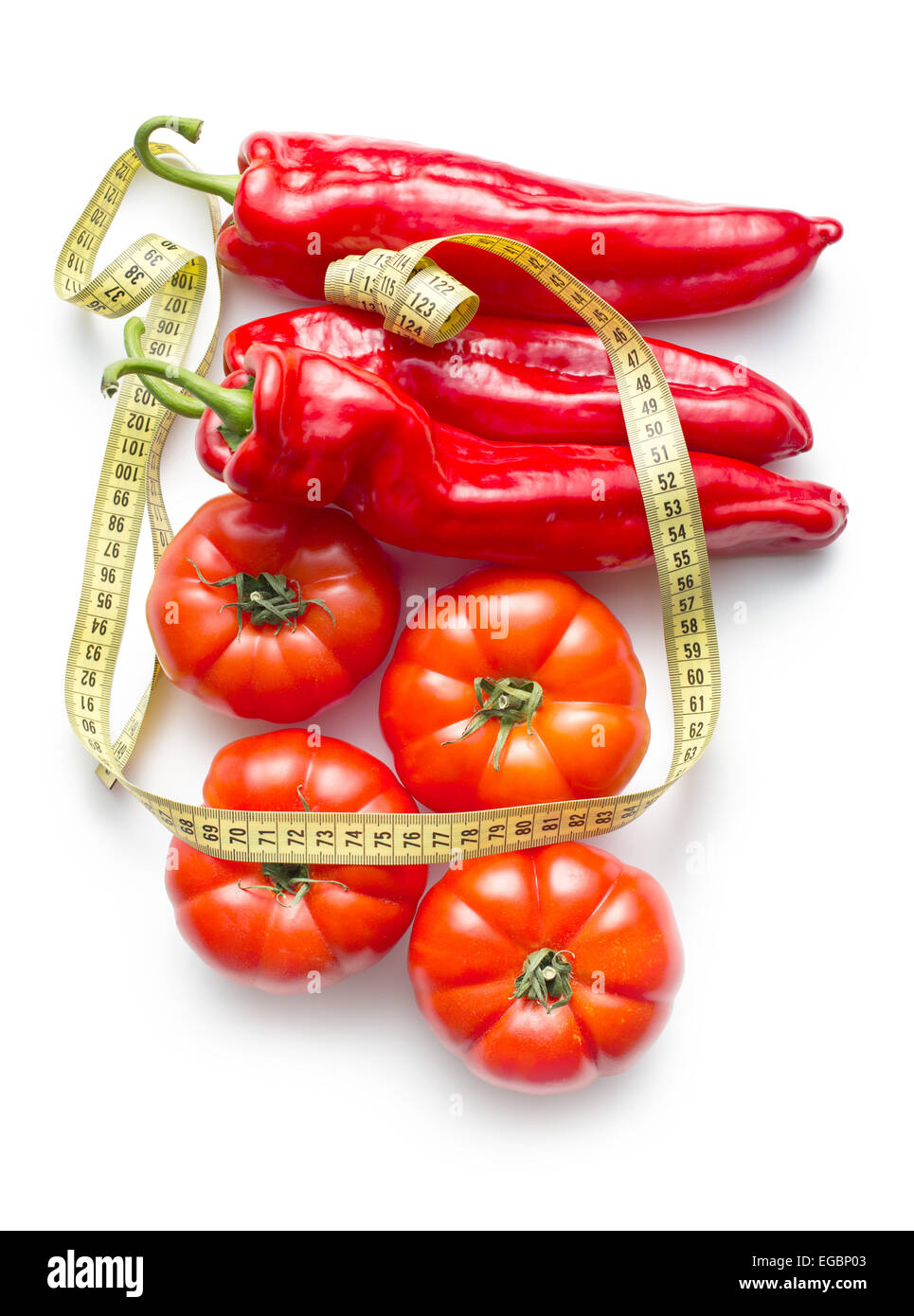 Diet concept. Peppers and tomatoes on white background. Stock Photo