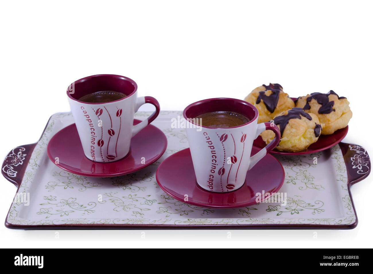 Two cups of coffee and a sweet pastry on a serving tray, isolated, Stock Photo