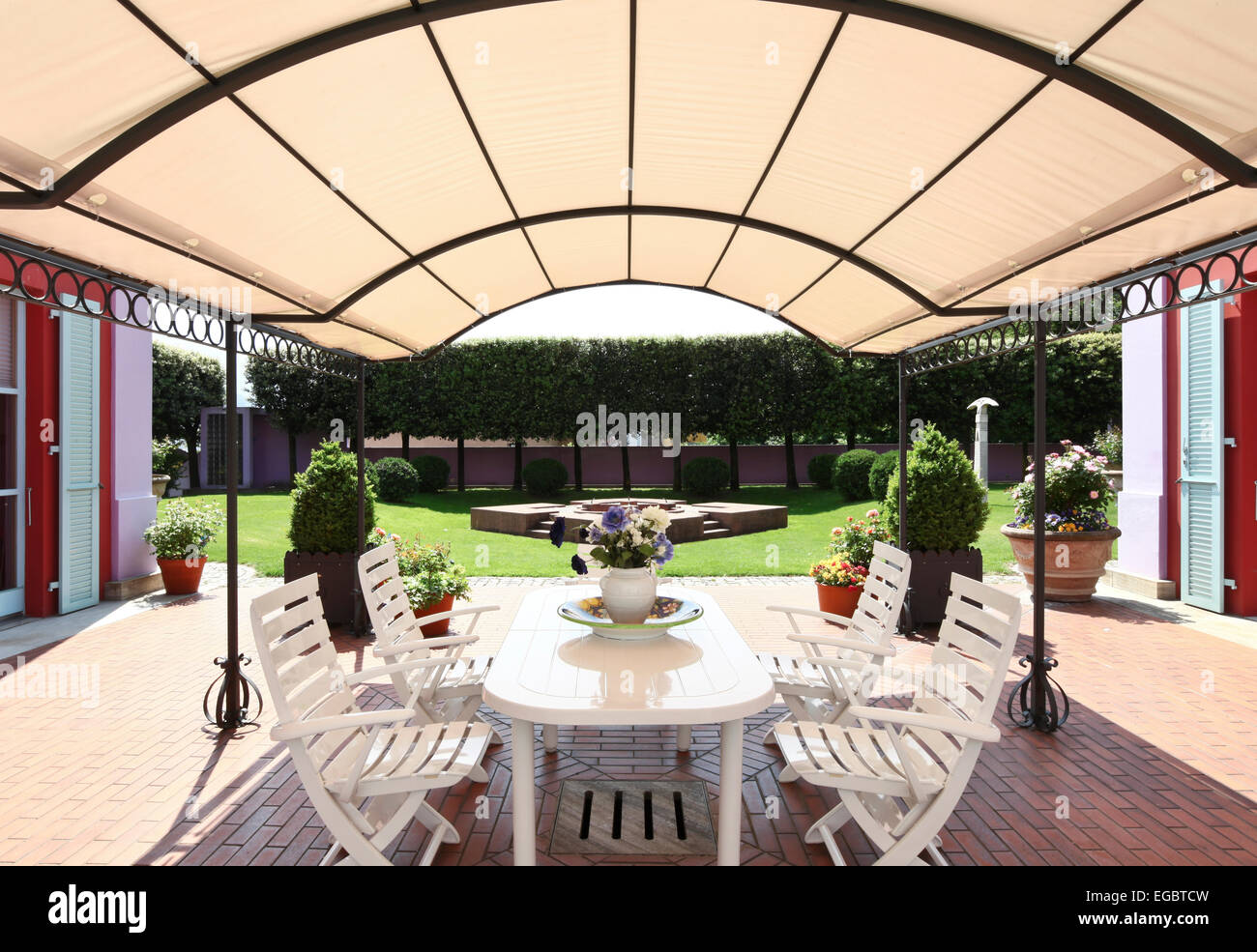 veranda with table and chairs Stock Photo