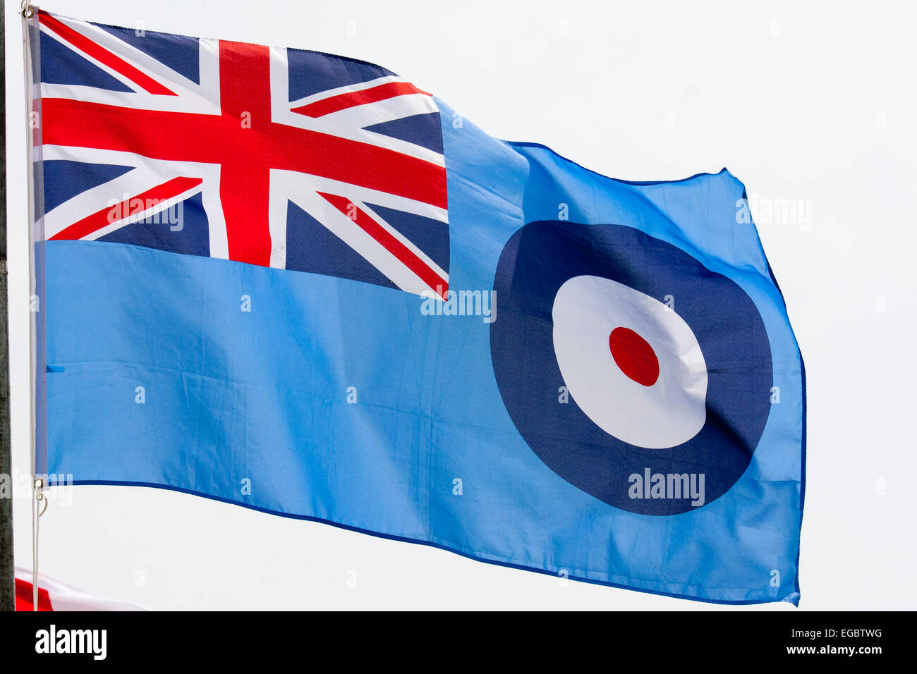 British RAF, Royal Air Force flag fluttering in the wind. Blue flag with Union  Jack in top left corner and RAF roundel opposite against blue sky Stock  Photo - Alamy