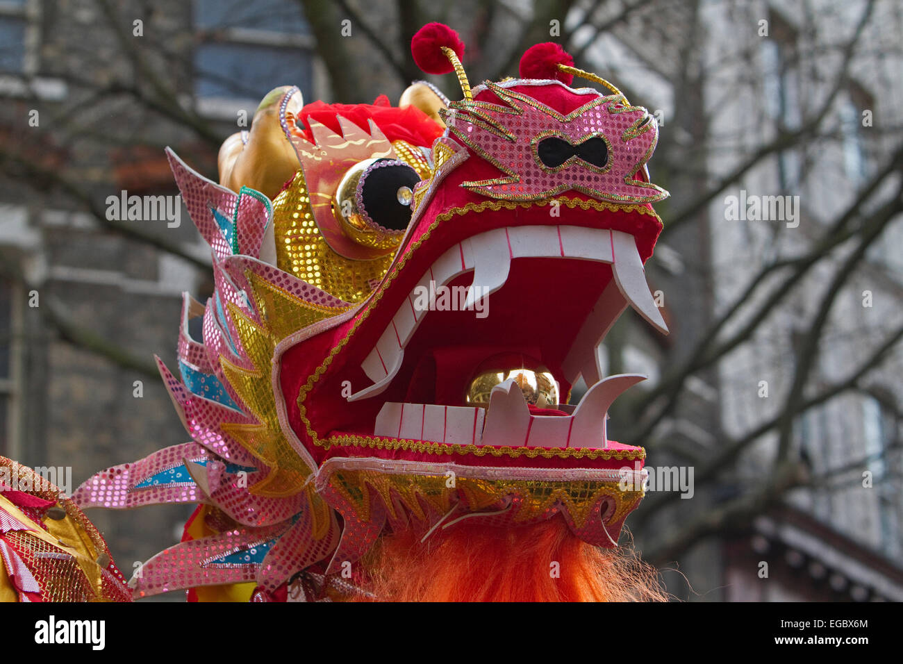 chinese dragon head at the chinese new year parade in london stock