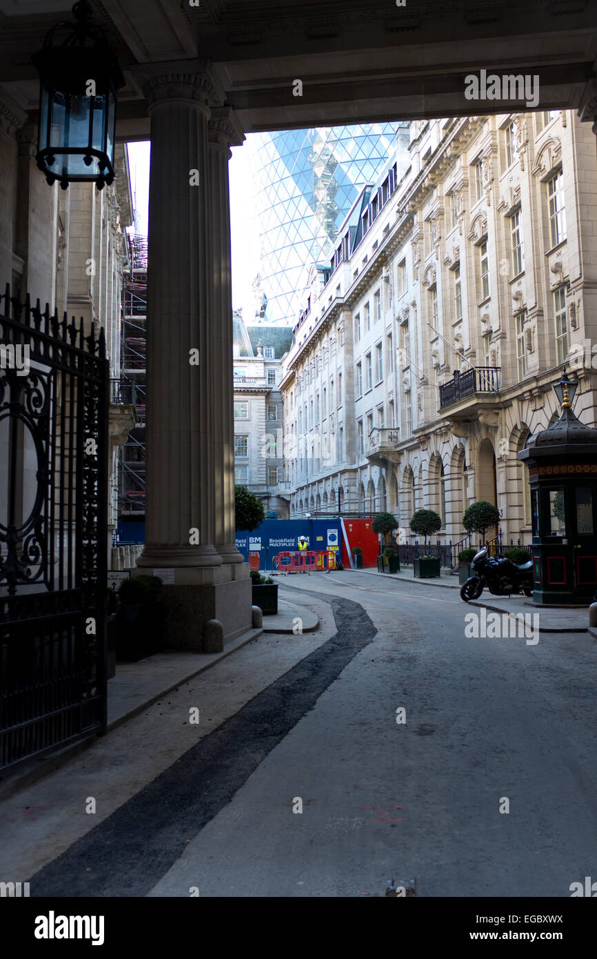 The Gherkin seen through St Helen's Place,one of London's most Architectural wonders mixed with the old and the new,London EC3 Stock Photo
