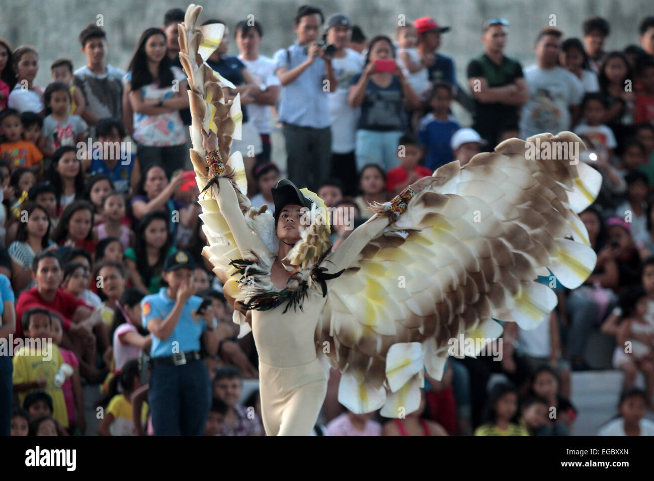 Makati City, Philippines. 22nd Feb, 2015. A student wearing bird ...