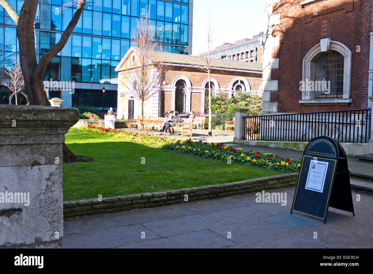 Old and New Architecture,Tranquil place to have lunch on a Spring sunny day in the city,St Botolph Church,Bishopsgate,London EC3 Stock Photo