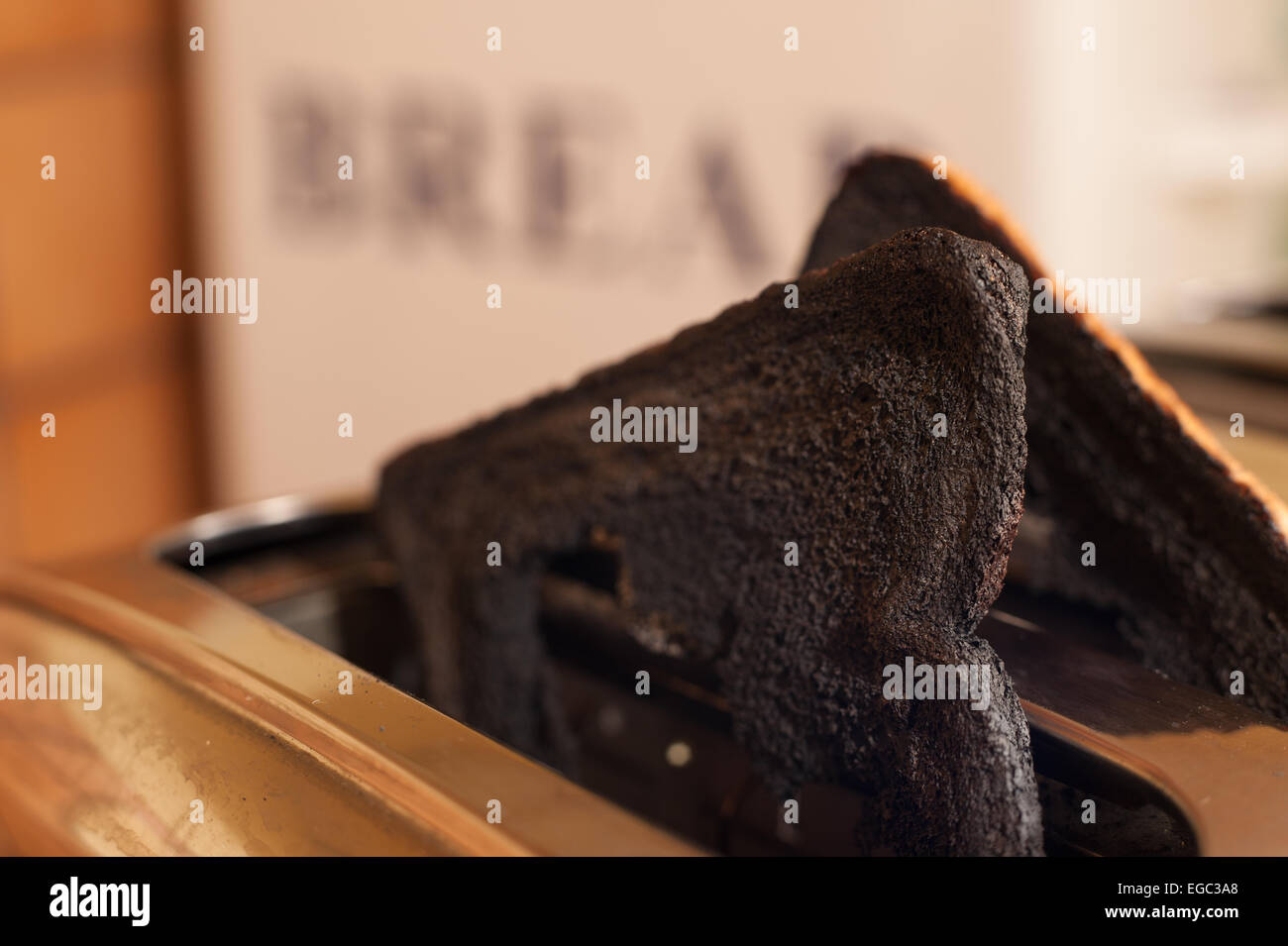 risk of fire smoking burning toast in the toaster in Stock