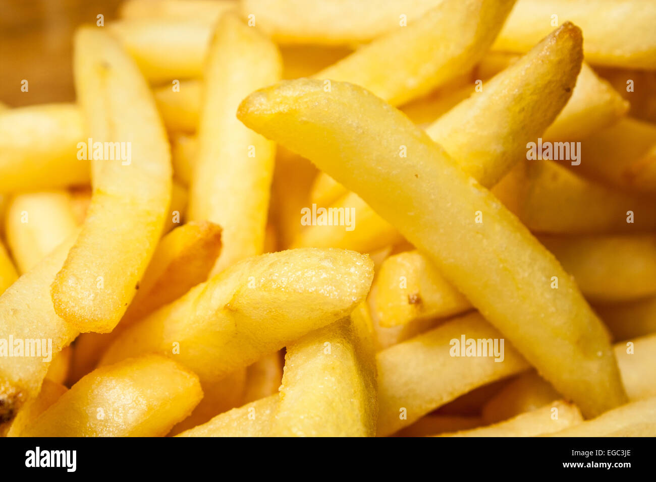 Tasty golden french fries on a plate Stock Photo