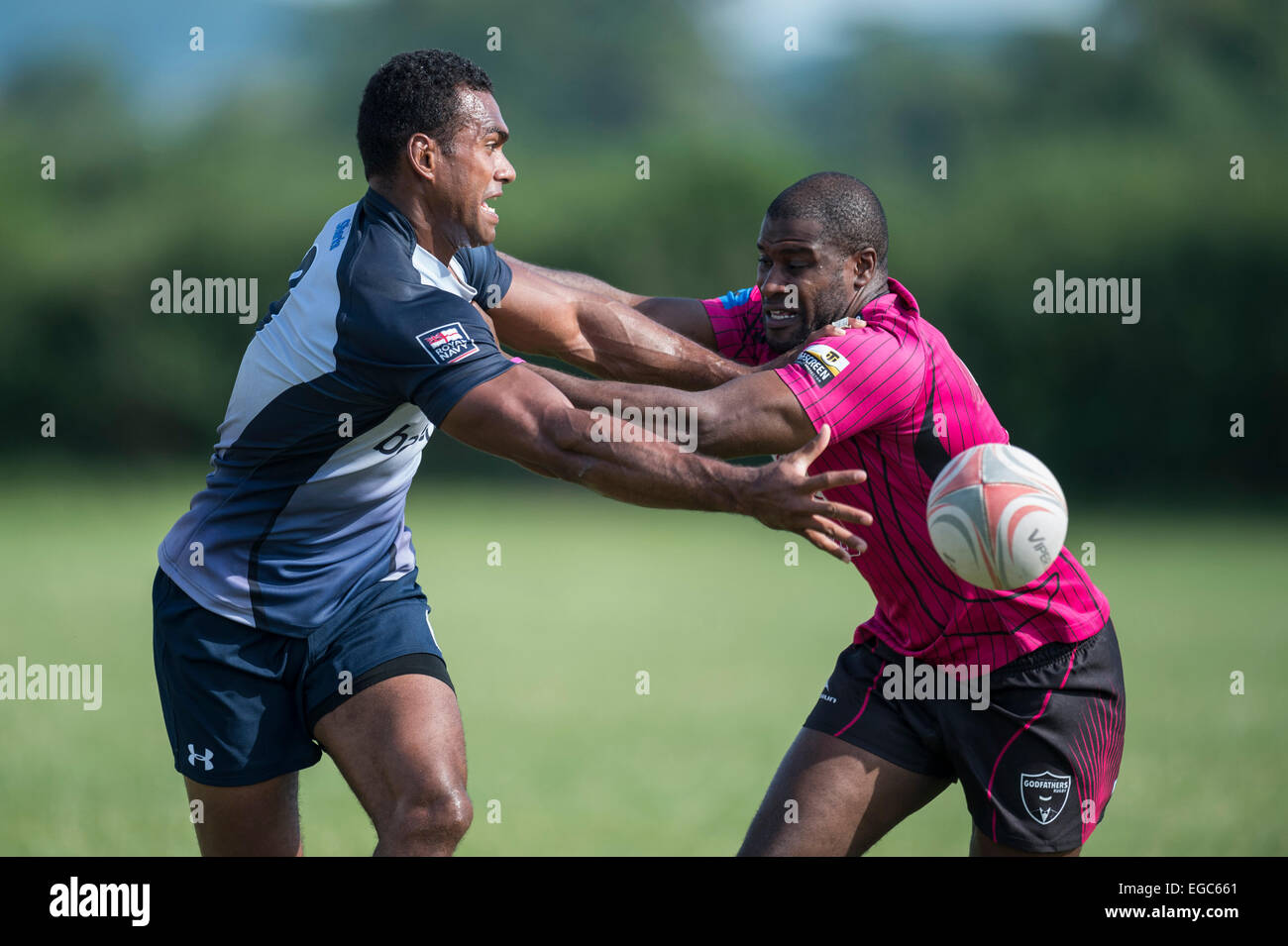 Rugby player passing ball. Stock Photo