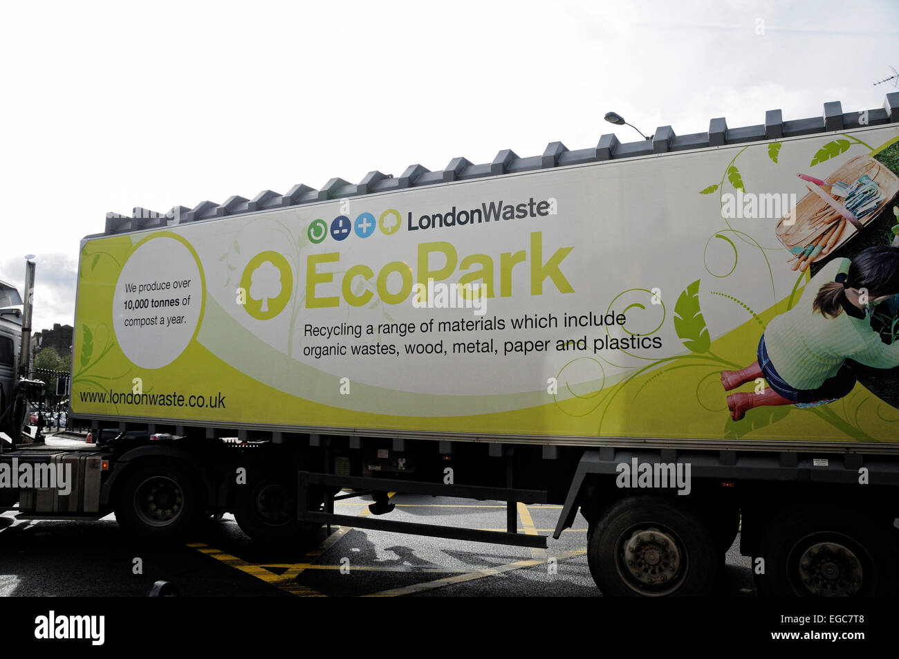 Large articulated lorry with London Waste and Eco Park on the side turning left into Drayton Park from Holloway Road A1, London Stock Photo