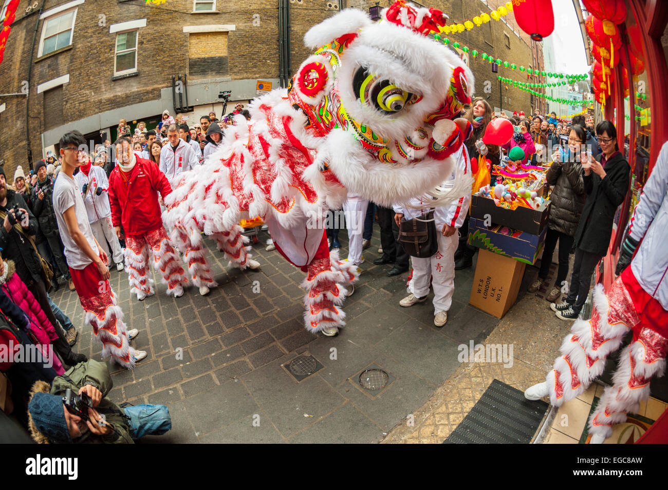 Lion Dancing in China Town London at the celebration of the year of the sheep or goat 2015 Stock Photo