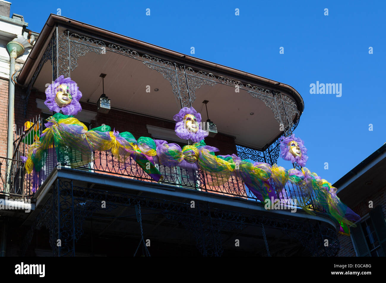 Mardi Gras Decorations on balcony in the French Quarter, New Orleans, Louisiana Stock Photo