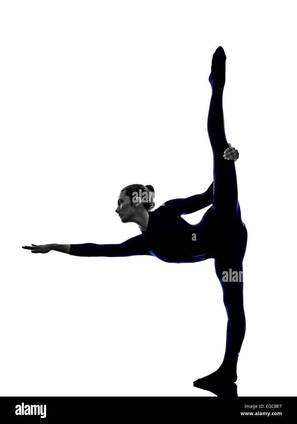 woman exercising Natarajasana dancer pose yoga silhouette shadow