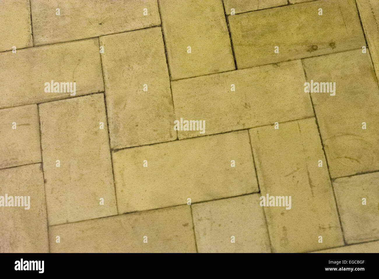 Yellow stone floor background from an old building Stock Photo