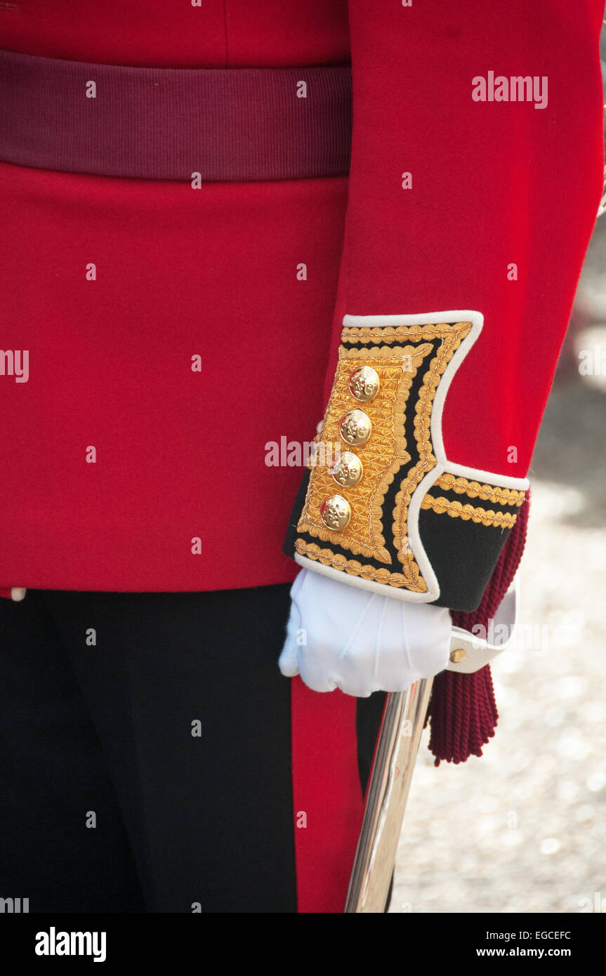 Closeup of the uniform of a redcoat guard at the Jewel House of the Tower of London. Stock Photo