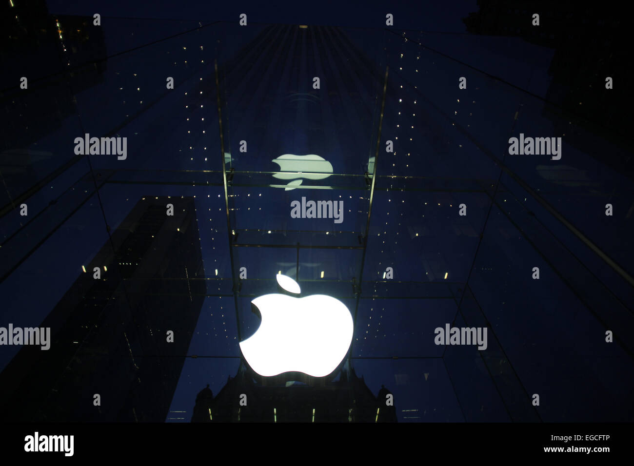 The Apple Logo, on the glass fronted Apple Store, surrounded by the ...