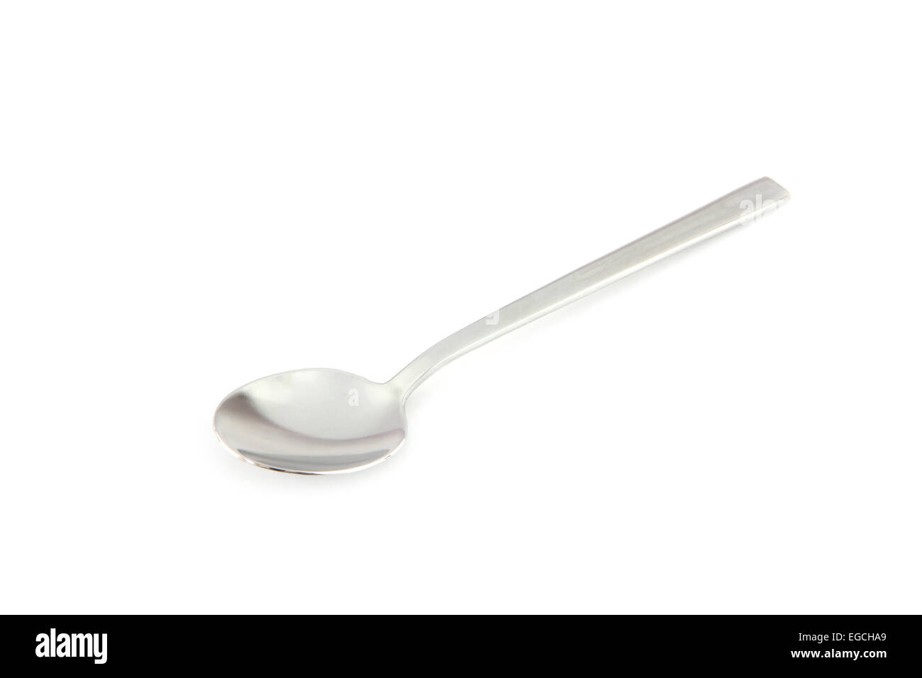 Stainless steel spoon on white background. Stock Photo