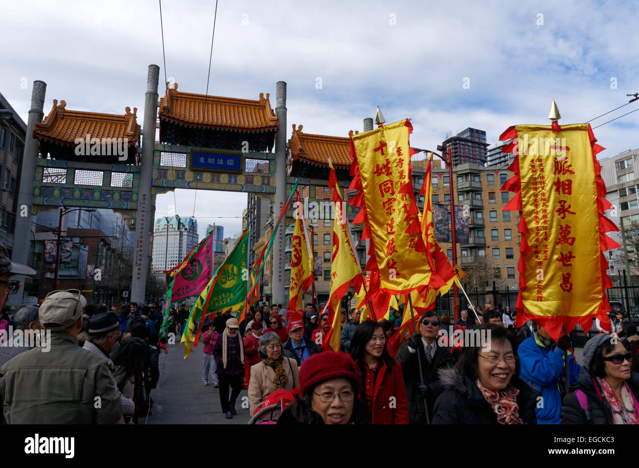 Marchers carrying banners in the annual Chinese New Year Parade in