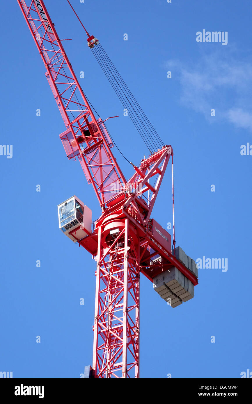 A construction crane at work on a new downtown Seattle Hi-Rise building                                . Stock Photo
