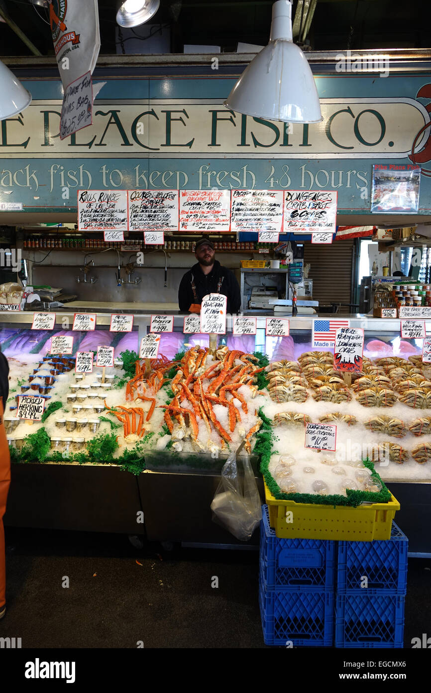 Fresh seafood is sold daily at the Pike Place Fish Company in Seattle, WA. Stock Photo