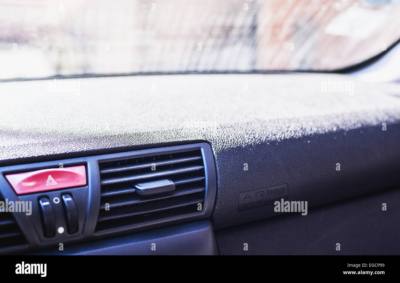 Details of a control table inside car with focus on air bag. Stock Photo