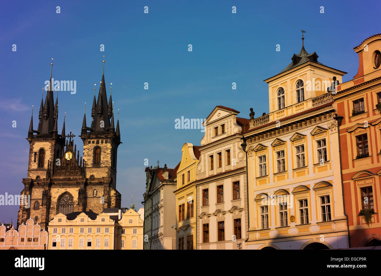 Restored historic buildings around Prague's Old Town Square.  The Church of Our Lady Before Tyn is in the left background. Stock Photo