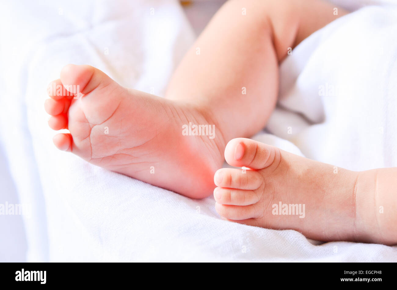 Baby feet newborn Stock Photo - Alamy