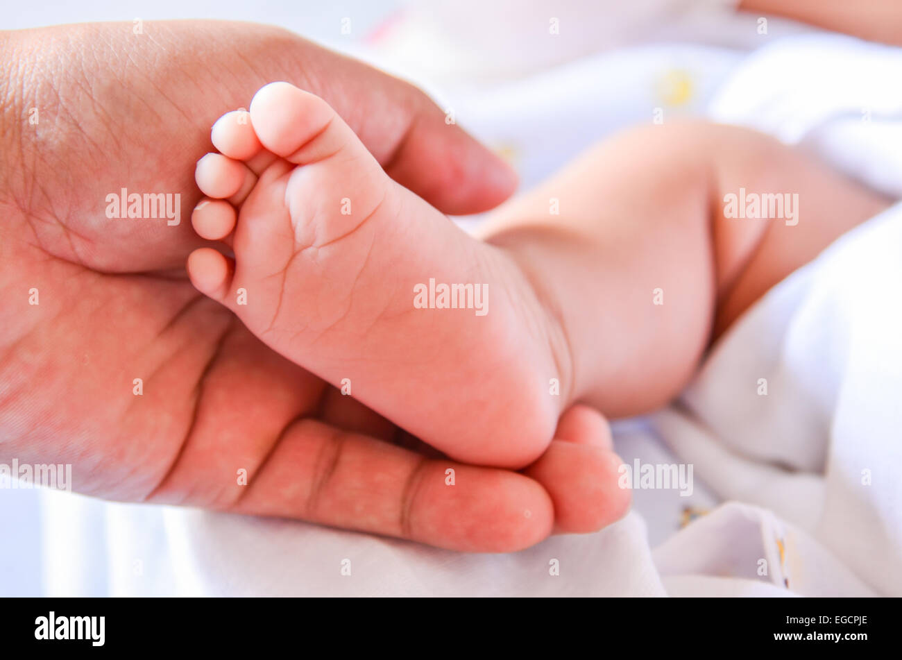 Baby feet newborn Stock Photo - Alamy