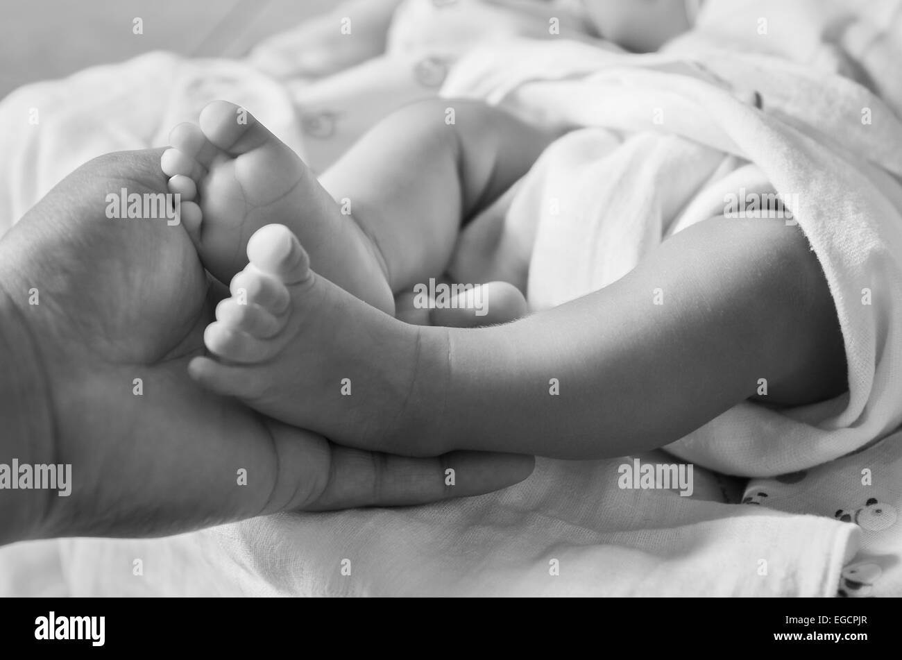 Baby feet newborn Stock Photo