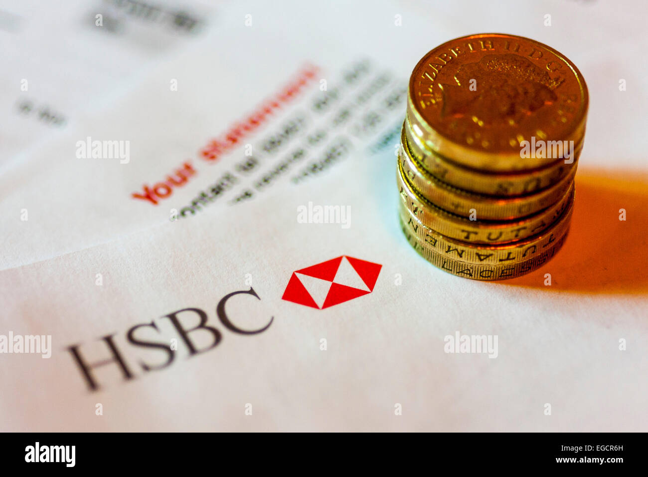 HSBC today issued their annual results citing a fall in profits of 17%. The company still racked up a surplus of 18.7 billion US dollars (£12.1 billion) for 2014 but this was short of City expectations and led to a 3% slide in HSBC's share price in early trading Stock Photo