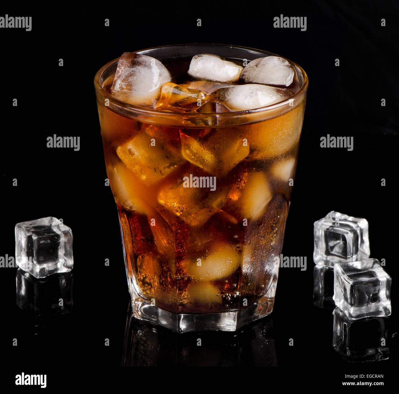 A glass of cola with ice cubes. Selective focus Stock Photo - Alamy