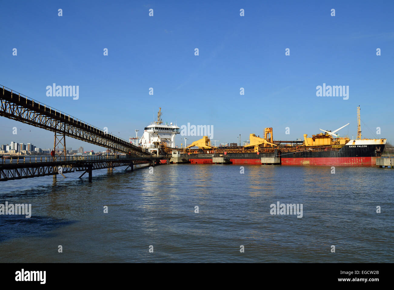 Sand Falcon Cargo ship loading, Thames River, London, United Kingdom Stock Photo