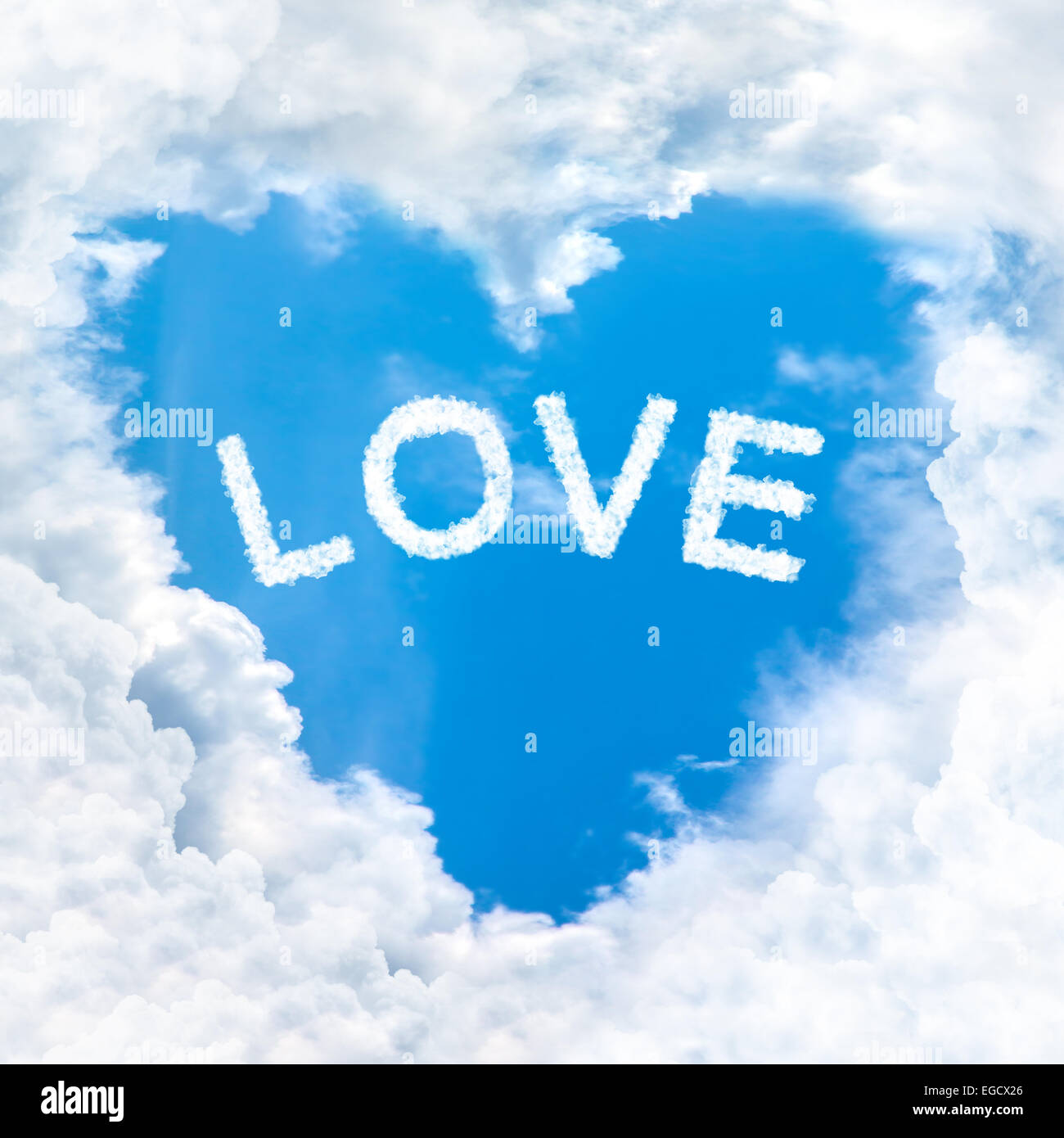 love word cloud heart shape blue sky background only Stock Photo - Alamy