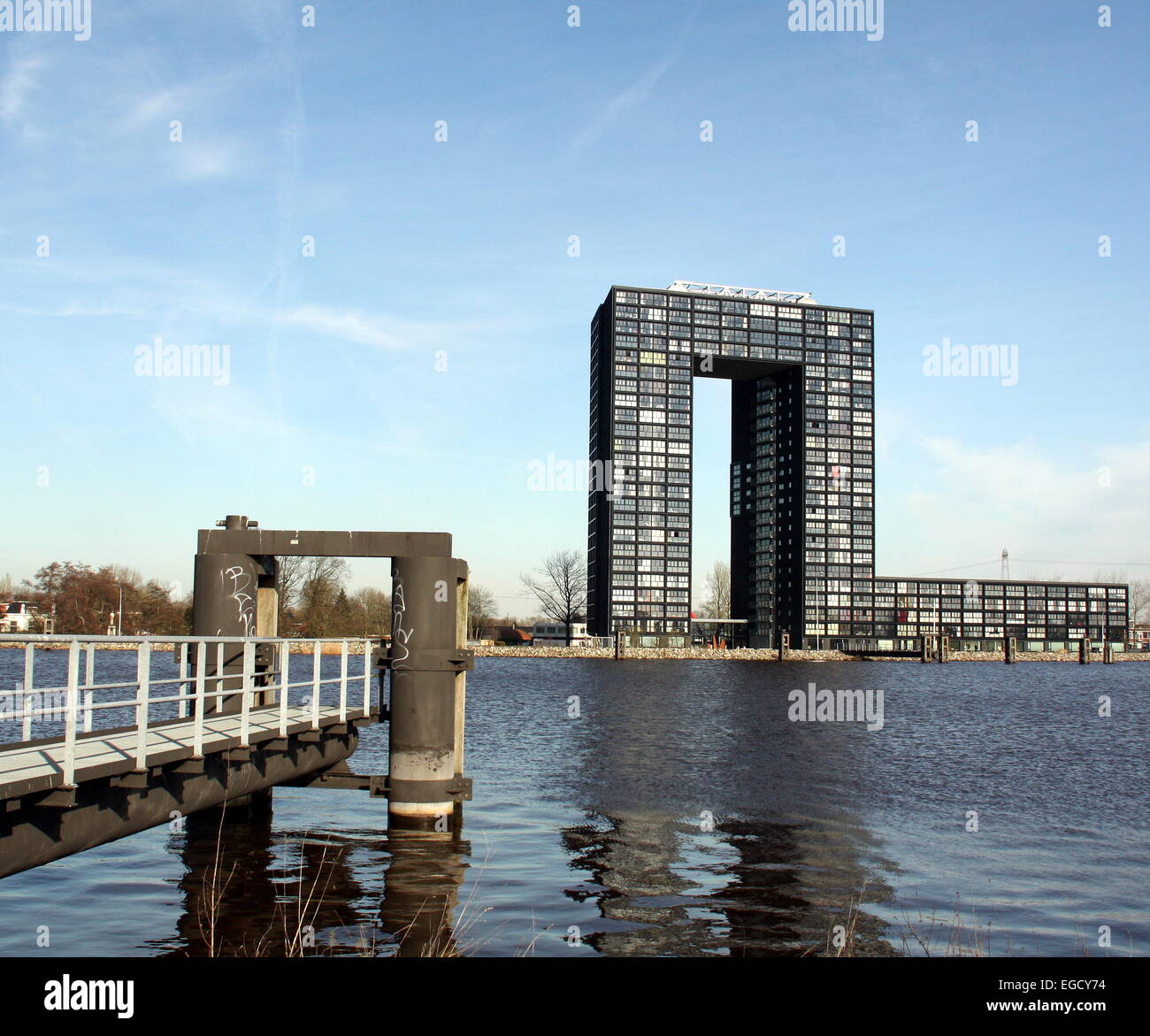 Modern apartment building (Tasman tower) and jetty in the city of