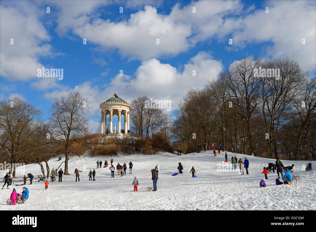 Sledging in front of the Monopteros, English Garden, Munich, Upper Bavaria, Bavaria, Germany Stock Photo