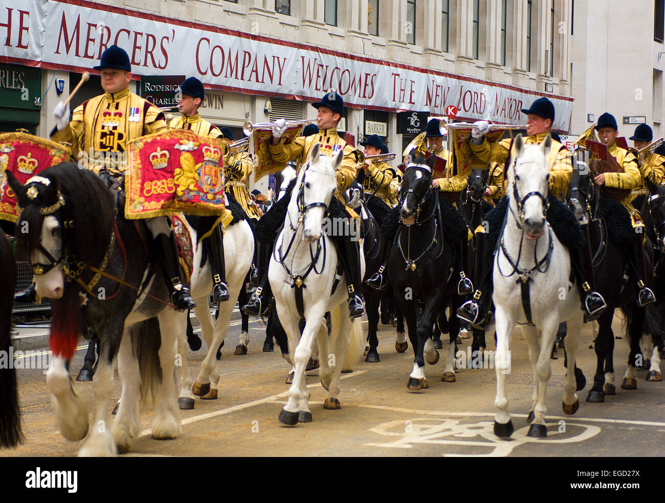 The Queen's trumpeters lead their mounted band along Cheapside in the Lord Mayor's Show. Stock Photo