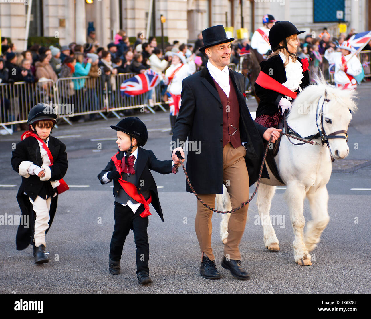 This pony and its team of small riders were definitely among the most popular participants in the 2013 New Year’s Day Parade. Stock Photo