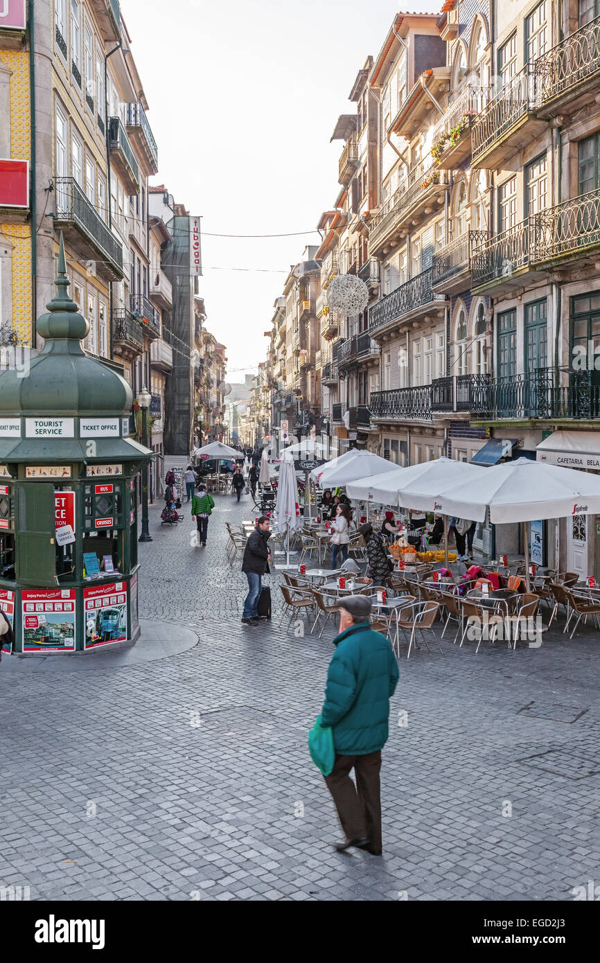 Porto, Portugal. Typical downtown street of the city of Oporto with the outdoor cafes and kiosks. Stock Photo