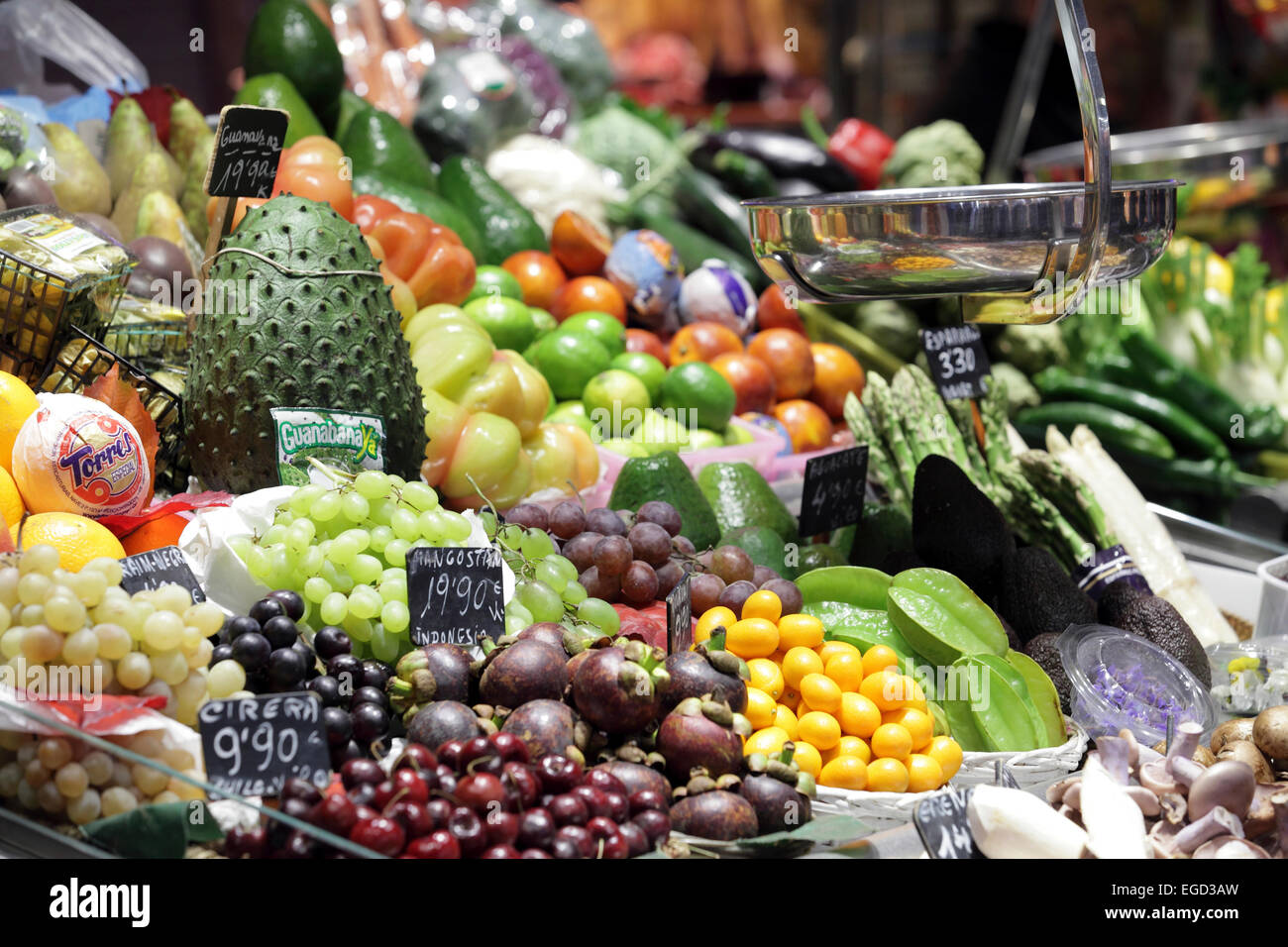 Exotic brightly colored fresh fruit for sale, Boqueria Market, La Rambla, Barcelona, Spain Stock Photo