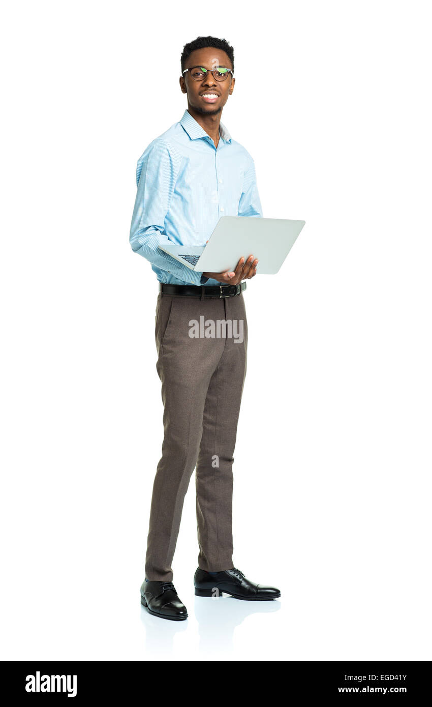 Happy african american college student with laptop standing on white background Stock Photo