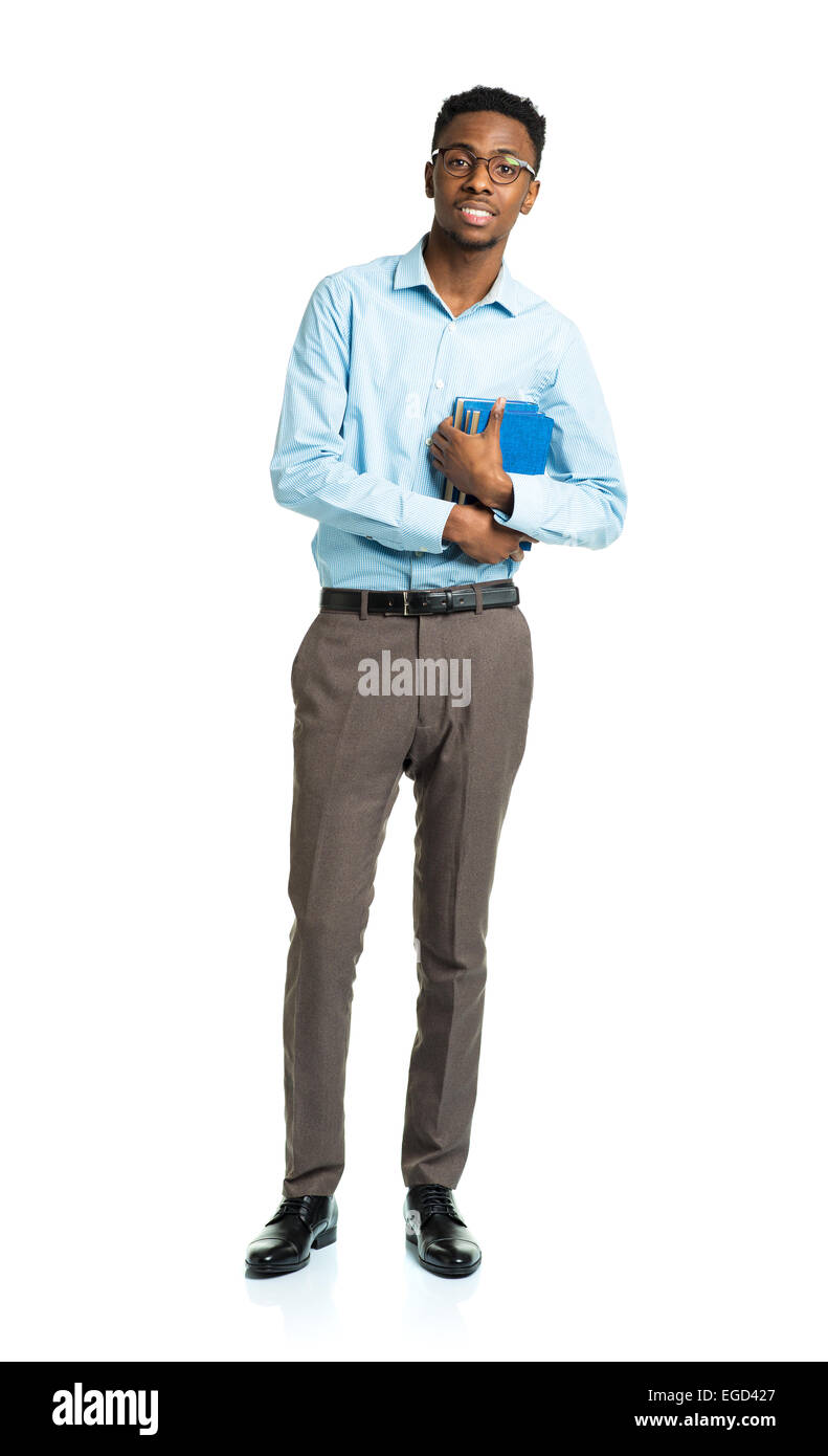 Happy african american college student with books in his hands  standing on white background Stock Photo