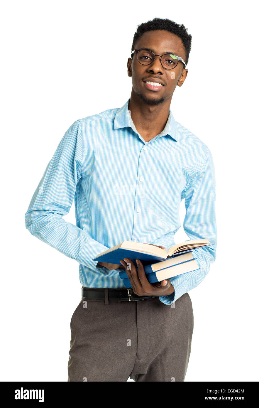 Happy african american college student with books in his hands  standing on white background Stock Photo