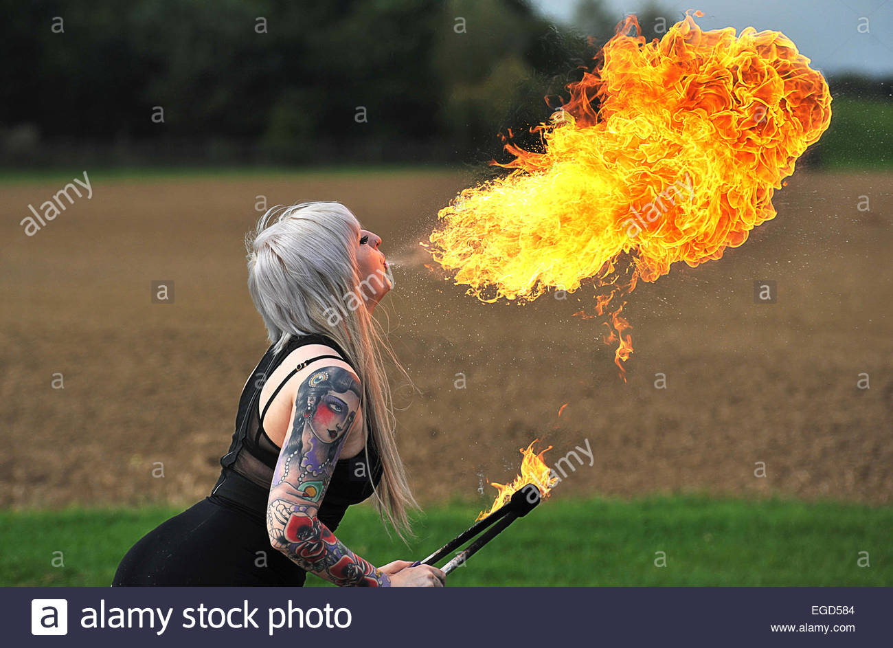 Female Fire Eater Stock Photos & Female Fire Eater Stock Images Alamy