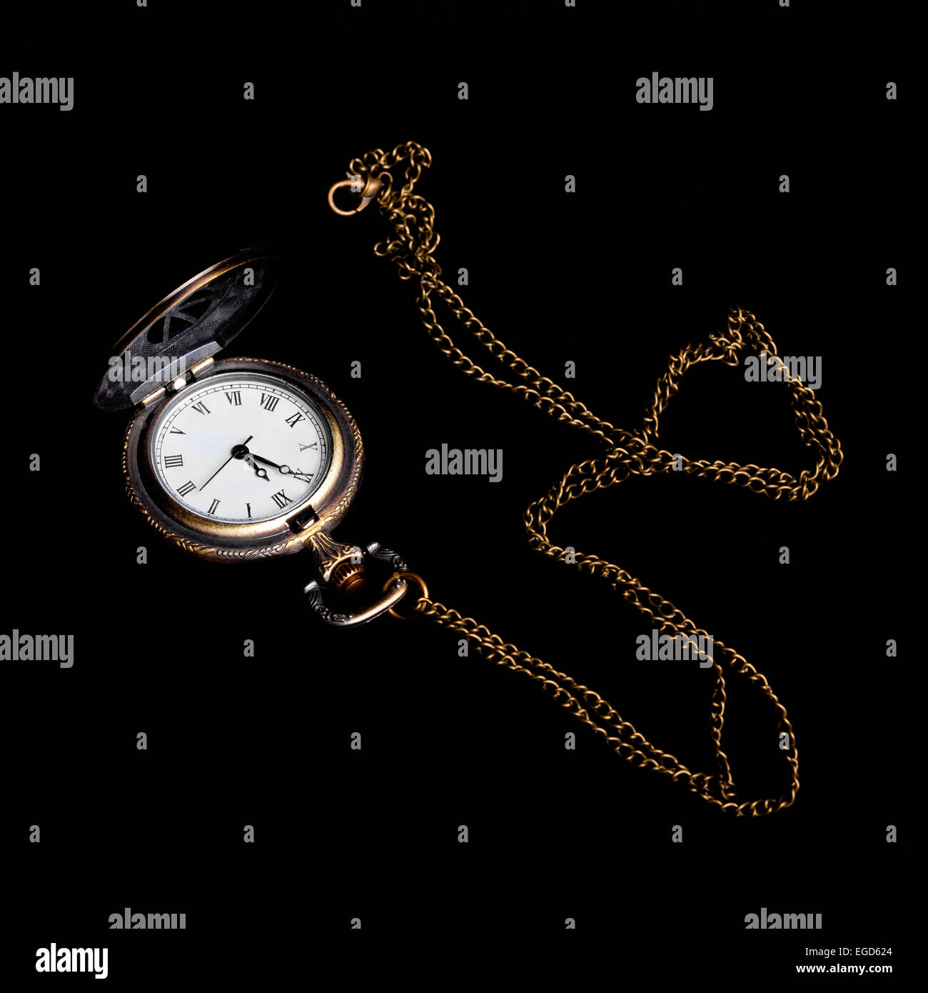 Square image of vintage watch with chain over black background Stock Photo