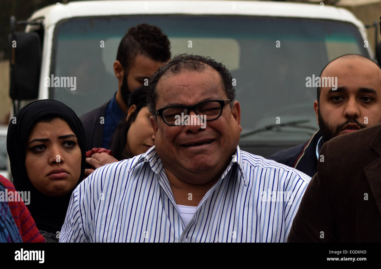 Cairo, Egypt. 23rd February, 2015. Relatives and supporters of Egyptian activist Alaa Abdel Fattah react after the verdict in his trial at a police institute in Cairo's Tora prison on February 23, 2015. Fattah, a leading dissident in the 2011 uprising that toppled strongman Hosni Mubarak, was sentenced by an Egyptian court to five years in prison over an illegal protest, while the remaining 24 defendants in the case received sentences ranging from three to 15 years Credit:  Amr Sayed/APA Images/ZUMA Wire/Alamy Live News Stock Photo