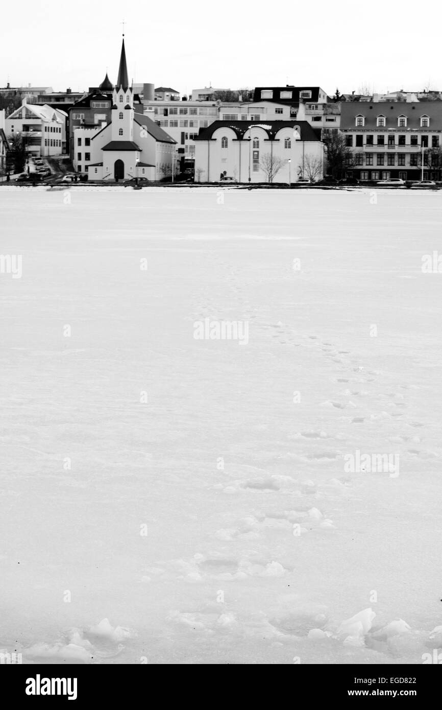 Frozen pond in the city Stock Photo