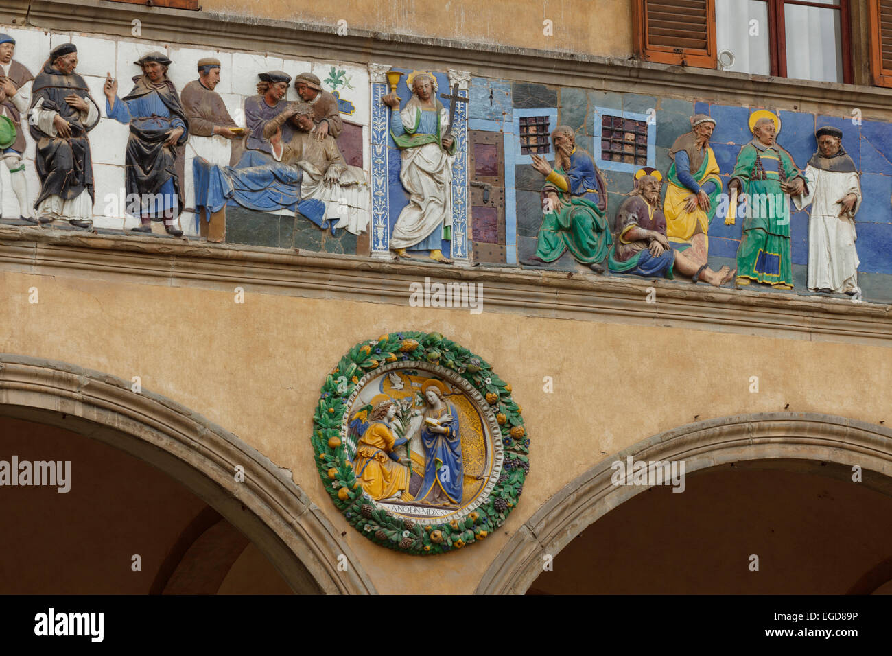 Medieval hospital, detail of the ceramic glaze frieze, tondo by Giovanni della Robbia, relief, Ospedale del Ceppo, hospital, 13th century, Pistoia, Tuscany, Italy, Europe Stock Photo