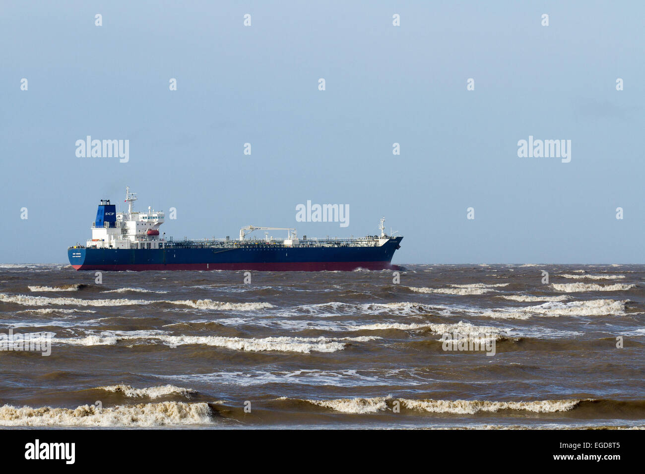 Liverpool, Merseyside, UK. 23rd February, 2015. UK Weather: Ship SCF PECHORA (Oil Products Tanker registered in Russia), as seen from Crosby Beach heading into the Irish Sea. Stock Photo