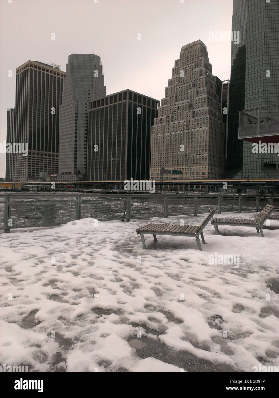 New York, USA. 23rd Feb, 2015. Snow and ice building up along the East River as record low temperatures hit New York City. Credit:  Christopher Penler/Alamy Live News Stock Photo
