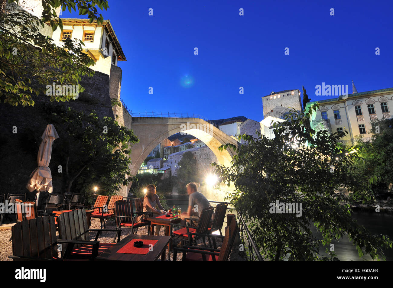 Restaurant at the old bridge at night, Mostar, Bosnia and Herzegovina Stock Photo