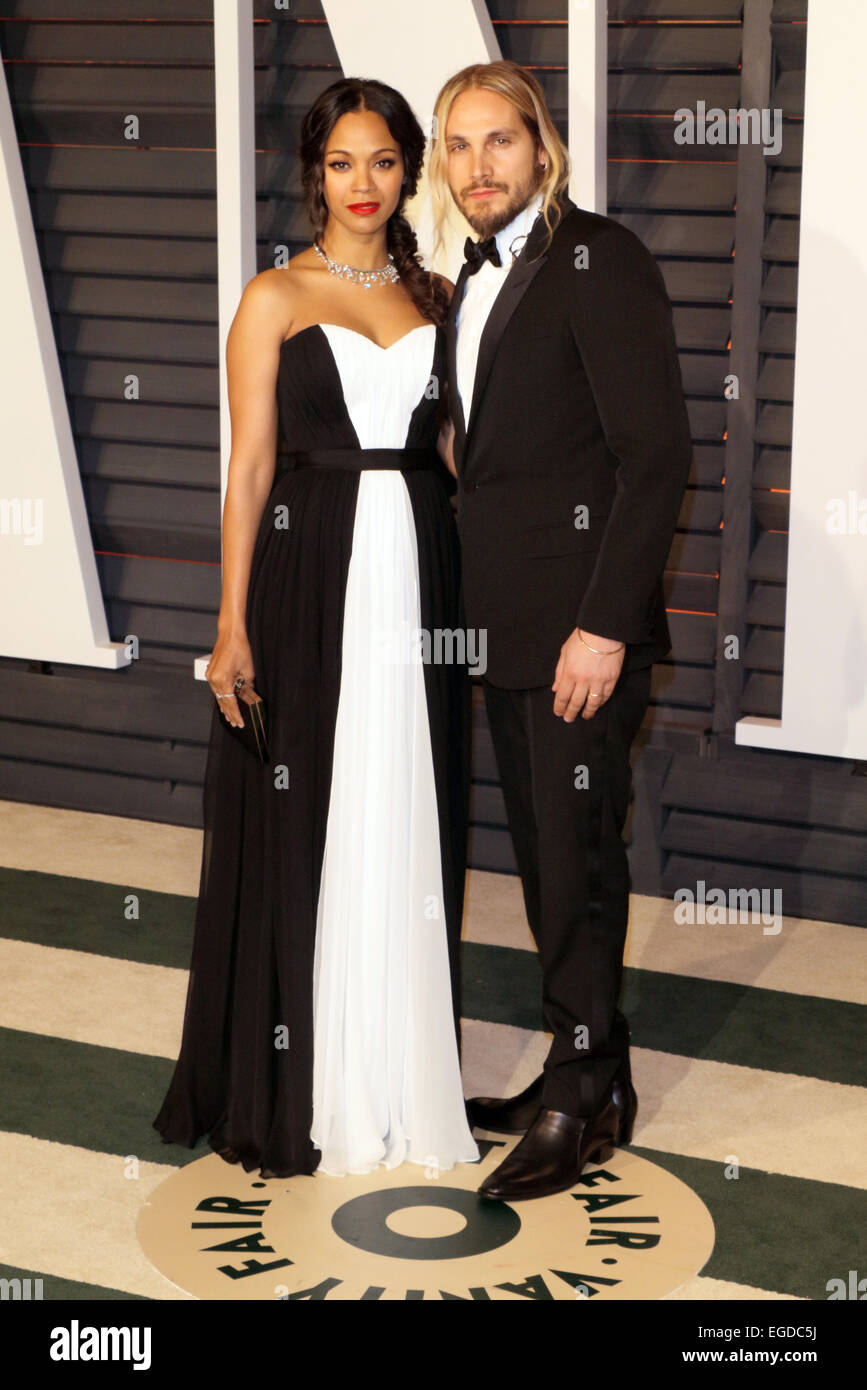 Actress Zoe Saldana and artist Marco Perego attend the Vanity Fair ...